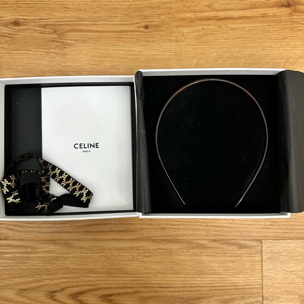 Authentic Celine brown tortoise headband with gold accent letters. NWT